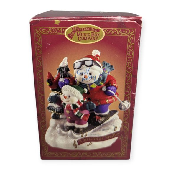 San Francisco Music Box Company "Christmas Medley" Sledding Snowman Ornament - Picture 1 of 15